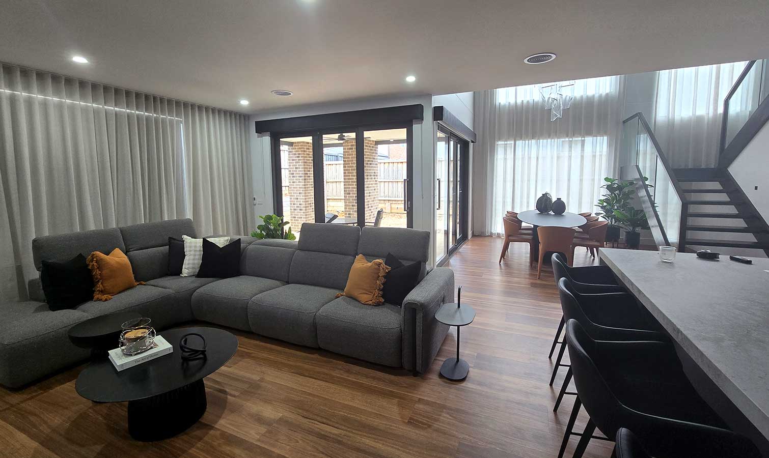 Motorised blinds and curtains in Berwick home by Fabric Creations