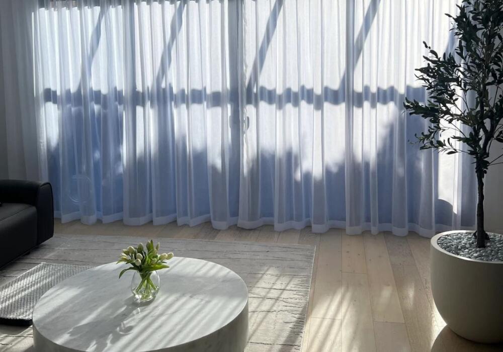 Sheers installed in living room by Fabric Creations
