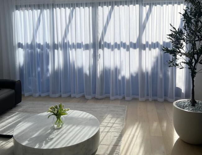 Sheers installed in living room by Fabric Creations