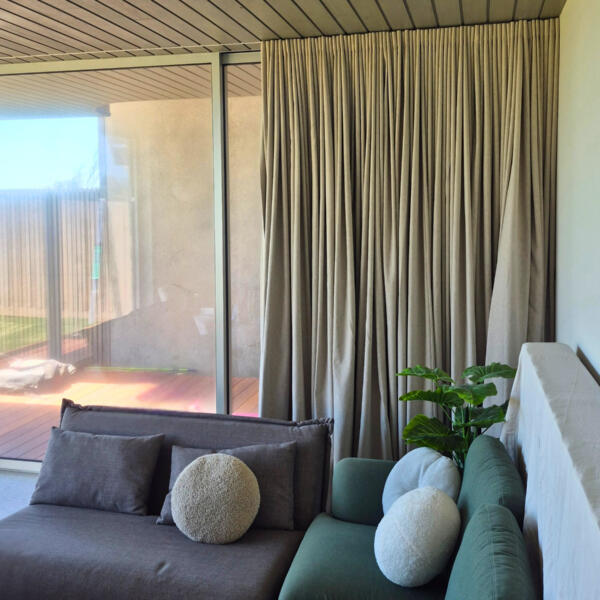 Lounge Area Featuring Open Sheer Curtains