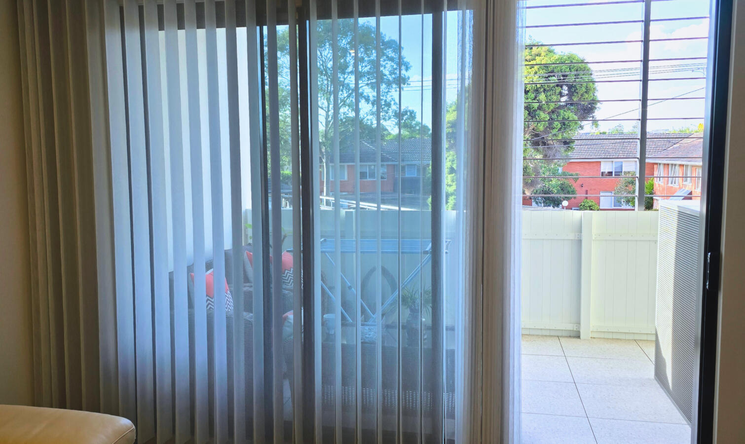 Veri Shades installed over balcony doorway, partially opened