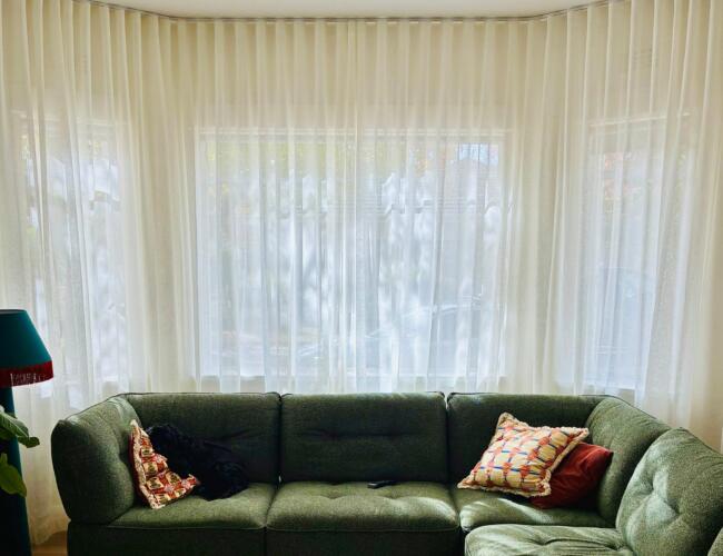 Curtain tracks to suit sheer wavefold curtains, bent to fit bay windows