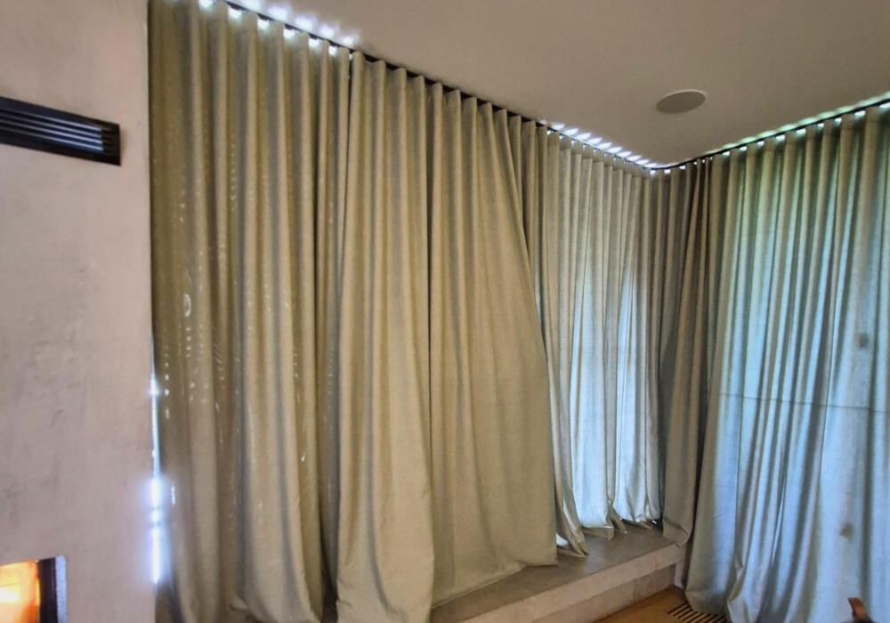 Curtain tracks to suit sheer wavefold curtains, bent to fit corner window